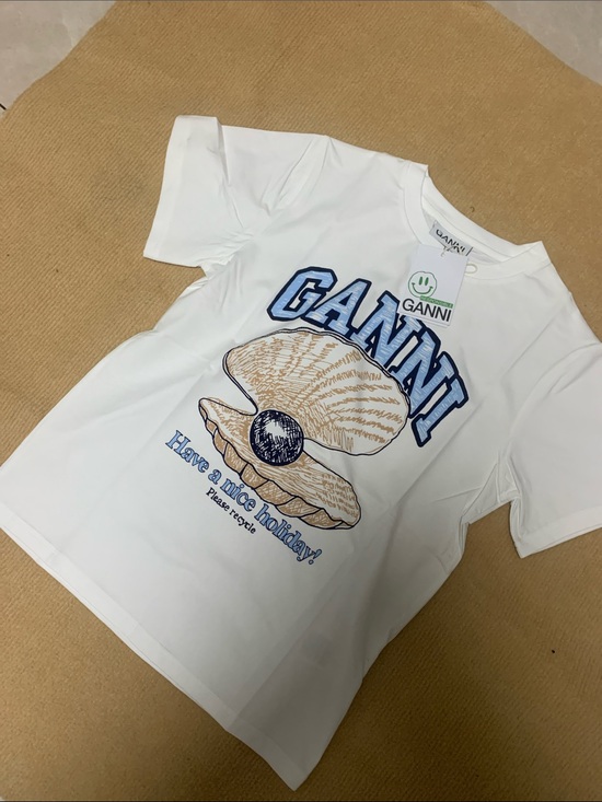 Ganni Tops - Ganni White Short Sleeve Tee with Navy Logo and Tan Pearl Shell